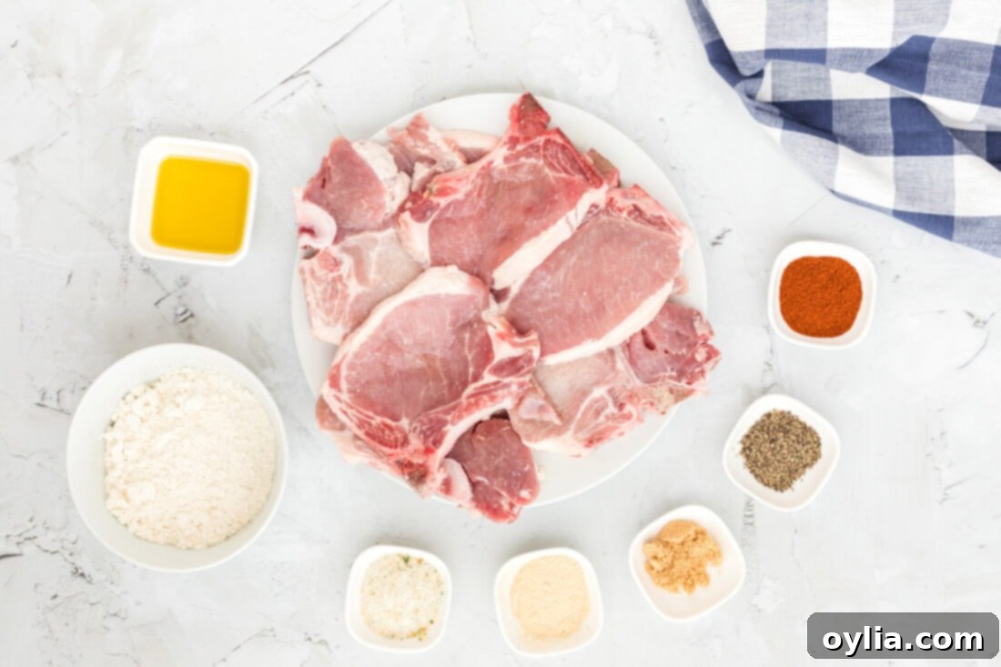 Ingredients laid out for Fried Pork Chops recipe