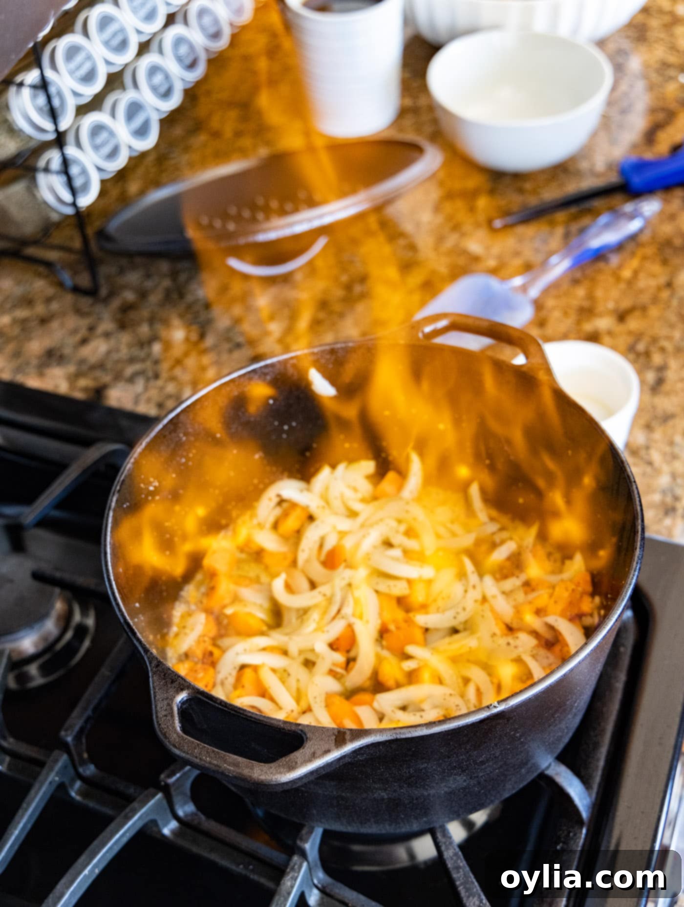 High flames from cooking Cognac in Beef Bourguignon, highlighting a chef's tip for safety