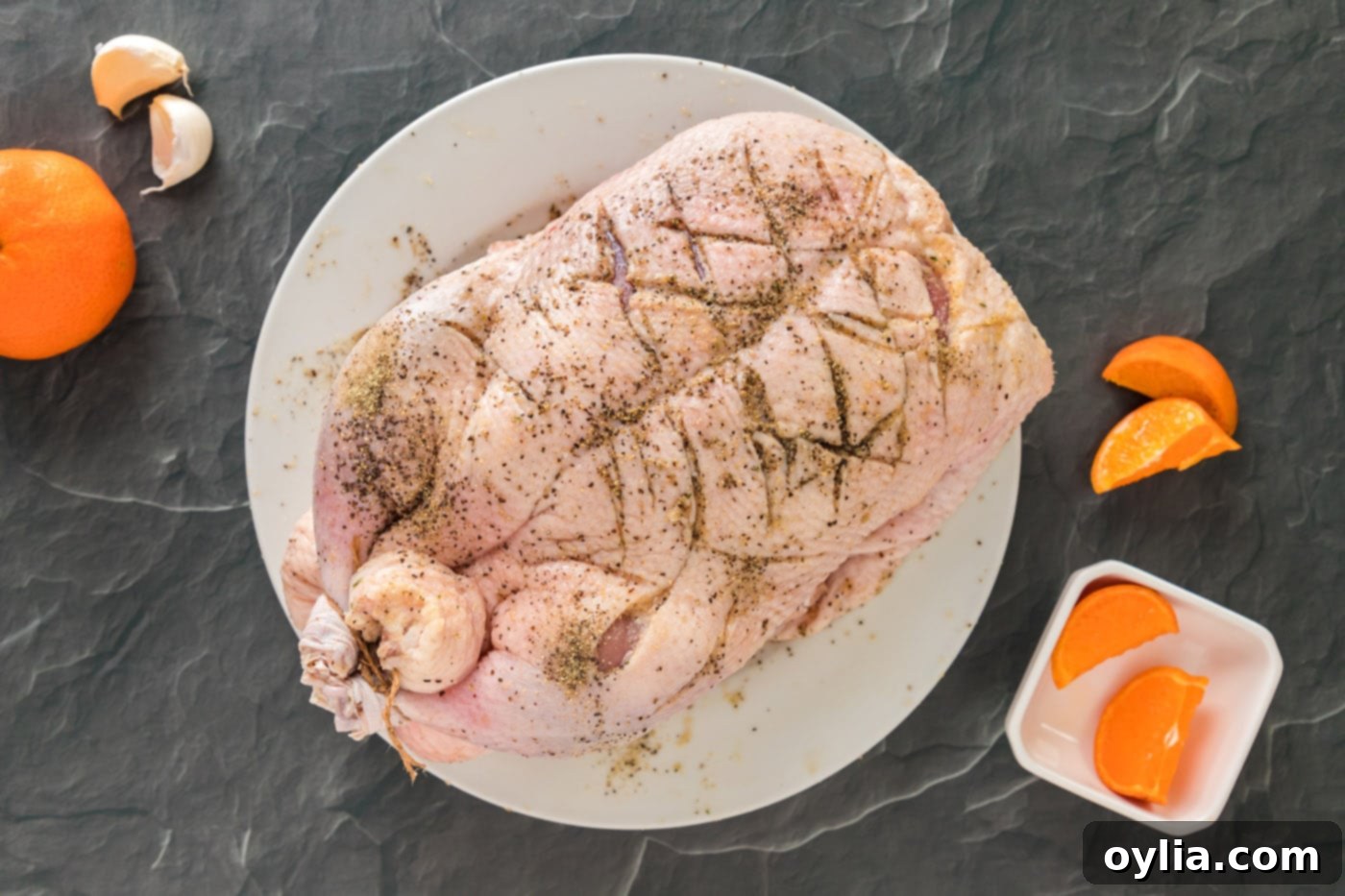 scored duck with seasoning