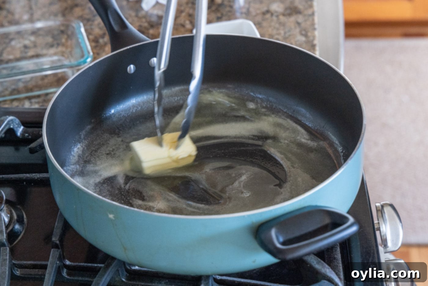 Melting butter and olive oil in a hot, heavy-bottomed skillet