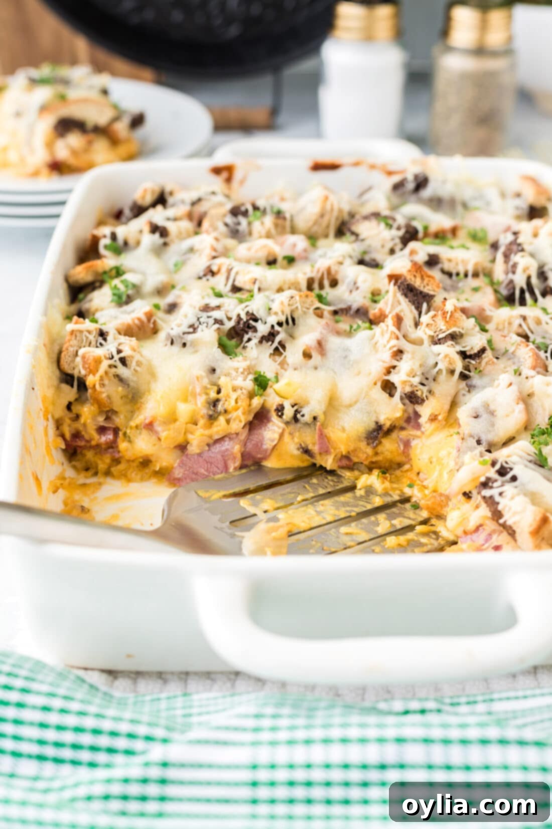 spatula in a pan of Rueben Casserole