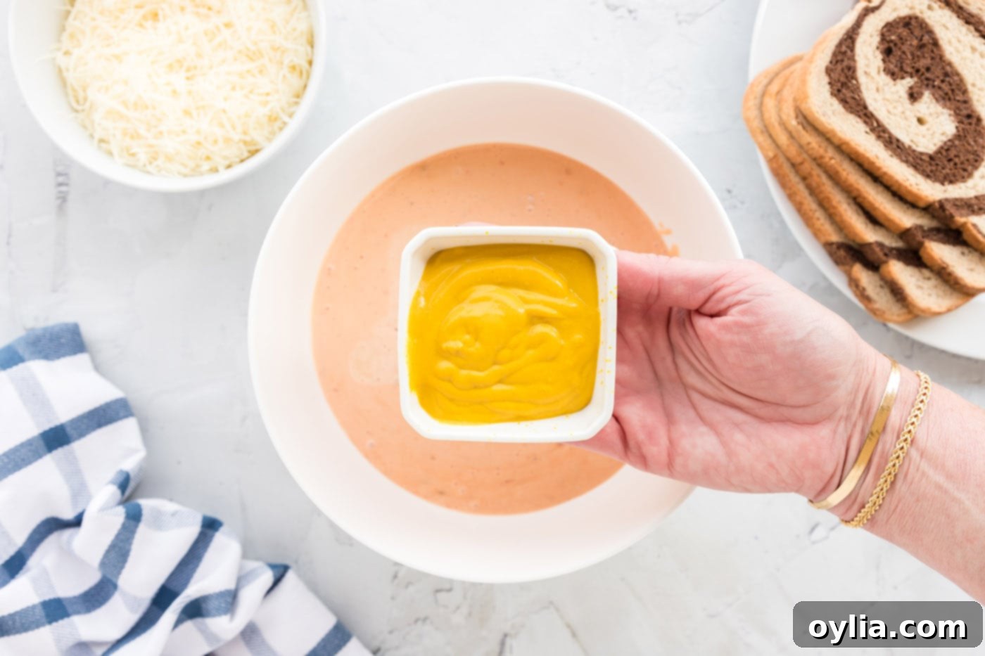 mustard over the top of thousand island dressing