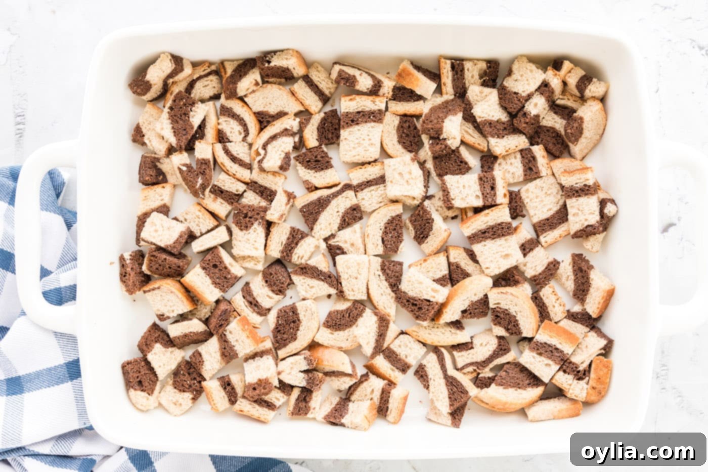 layer of cubed rye bread in a baking dish