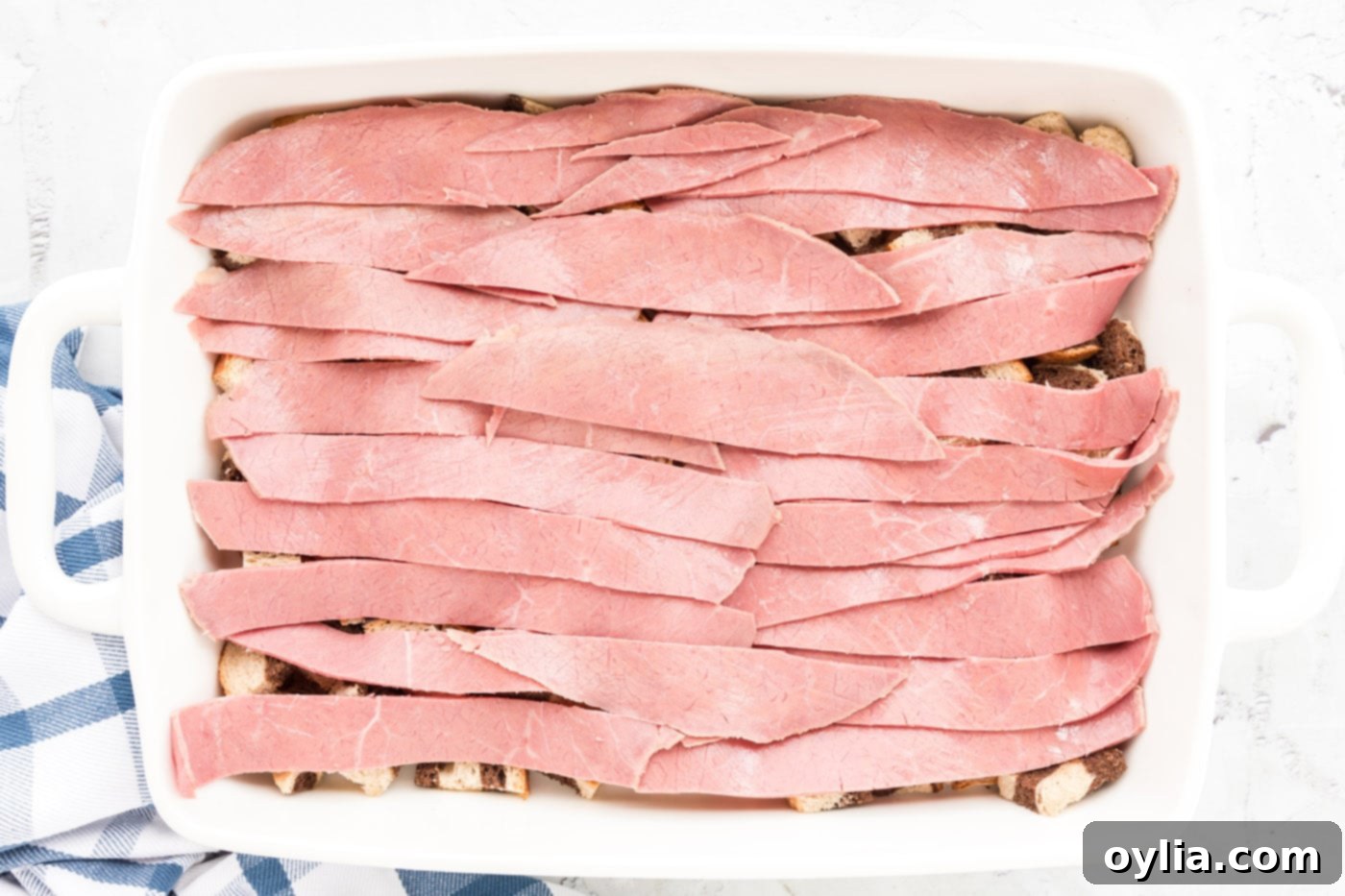 corned beef strips layered over bread cubes