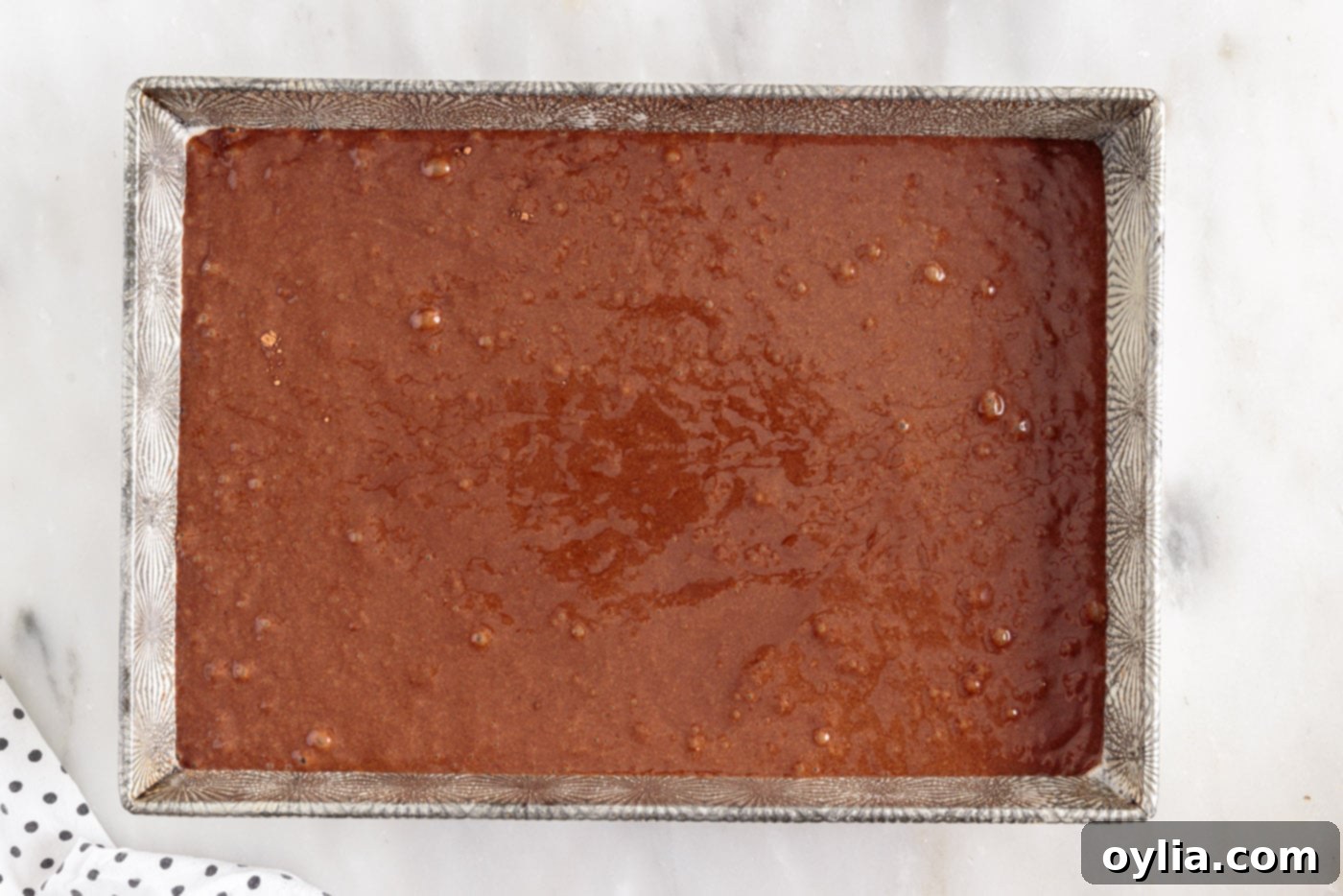 chocolate mayonnaise cake batter in a baking dish