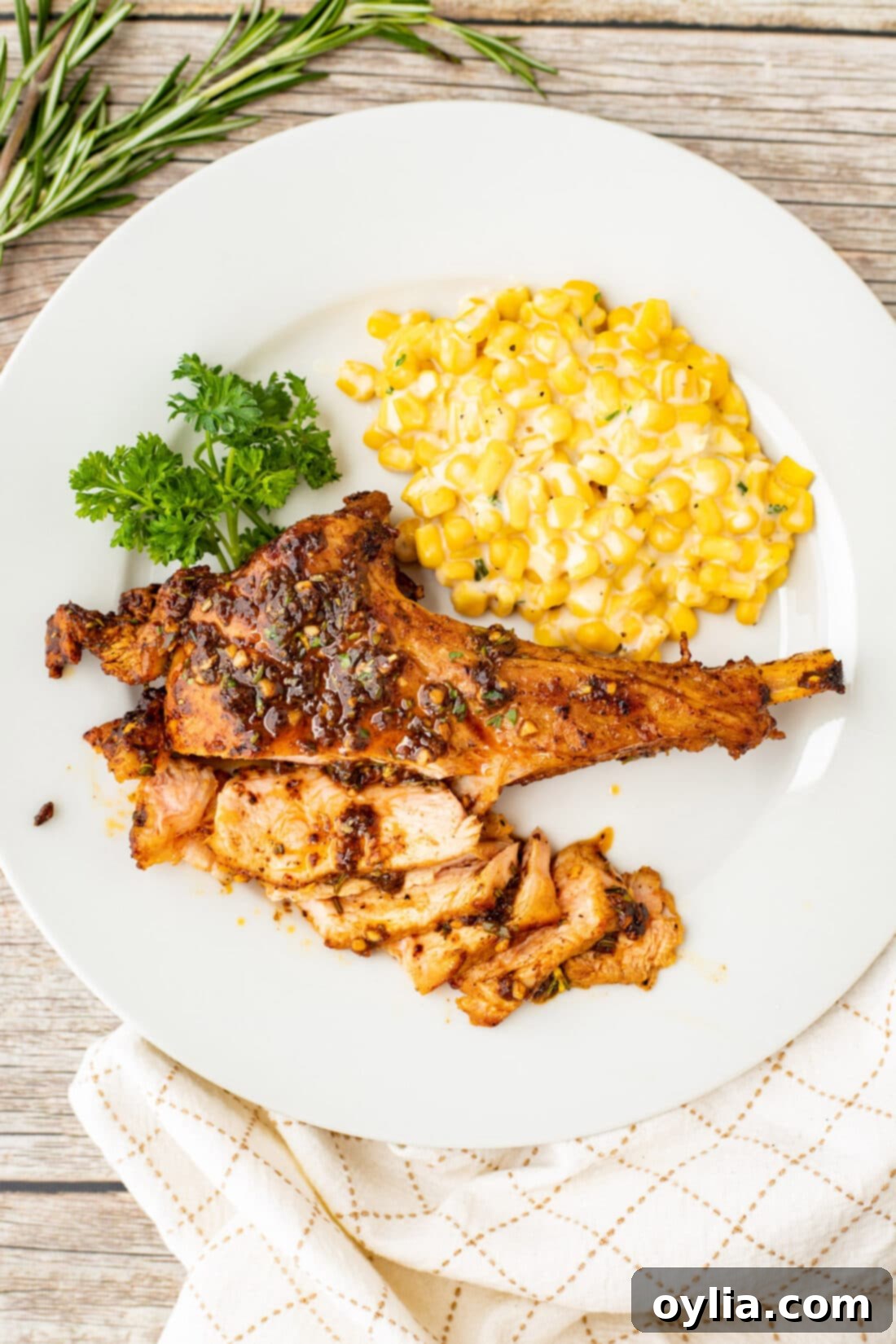 Veal Chop on a plate with creamed corn