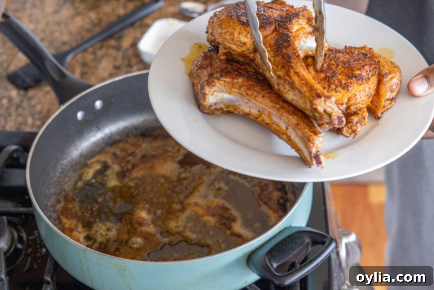 removing veal chops from skillet