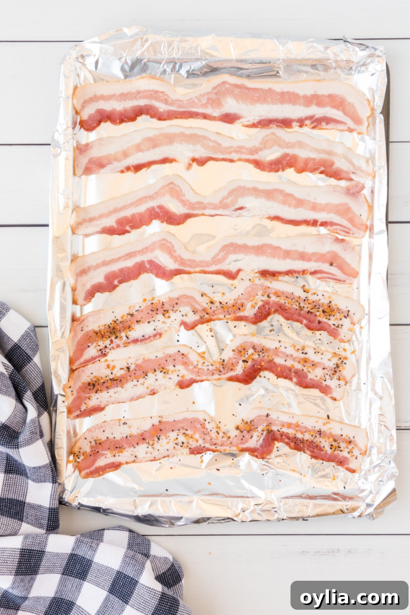 bacon on baking sheet with aluminum foil