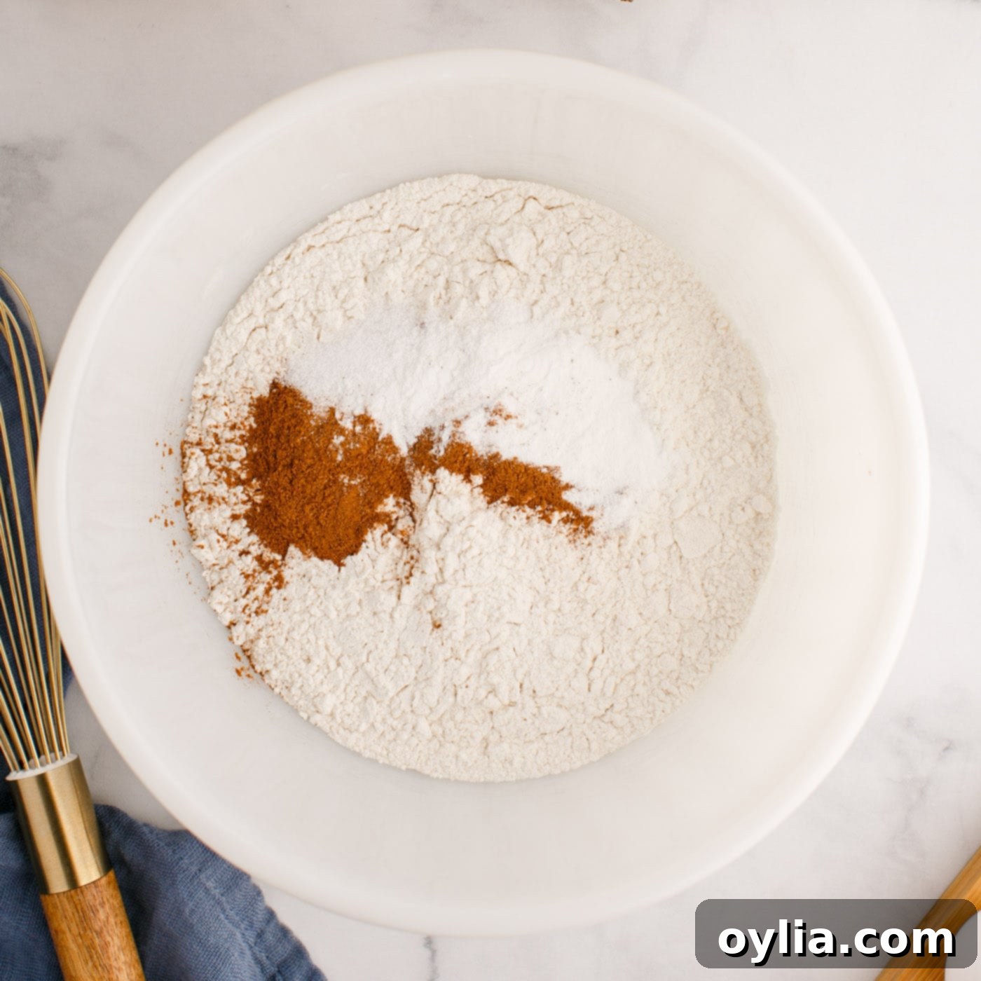 flour, baking powder, salt, and cinnamon in a bowl