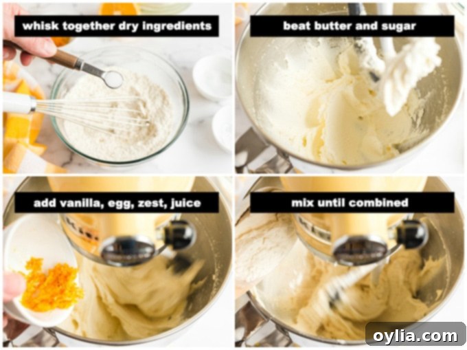 Cookie dough being mixed in a stand mixer, showing the creamy texture before flour is fully incorporated.