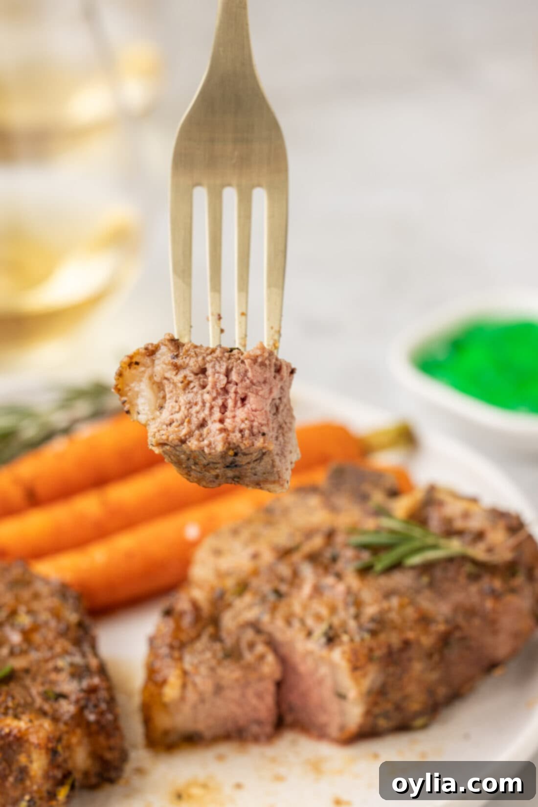 fork with cut lamb chop