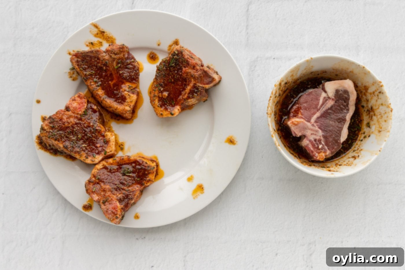 lamb chops with a wet rub on a plate