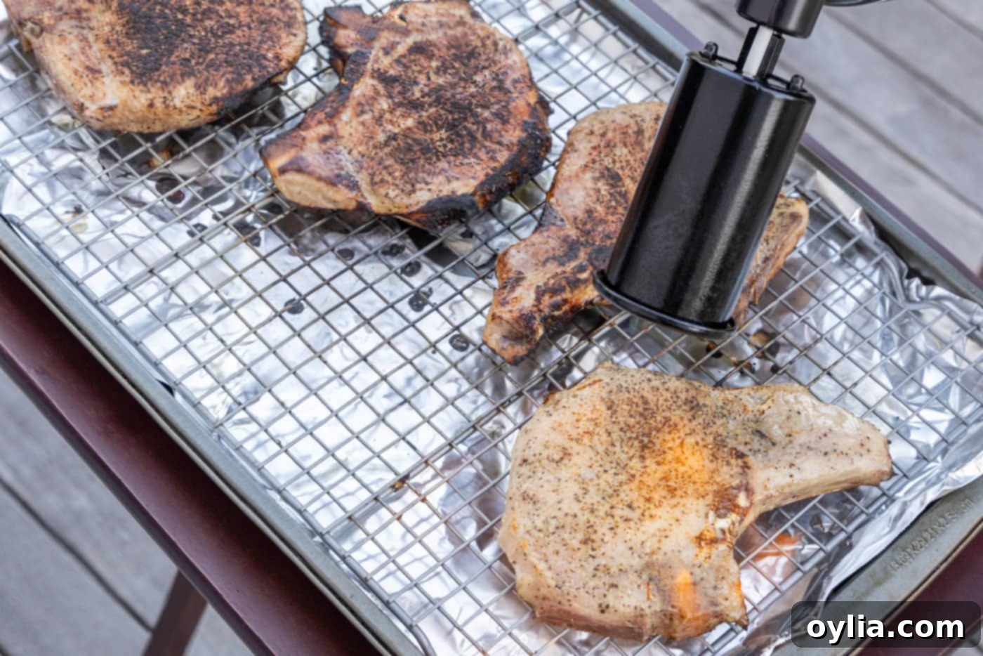 kitchen torch searing pork chops