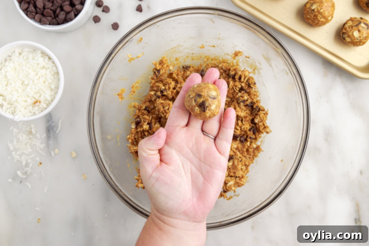 hand holding no bake energy ball