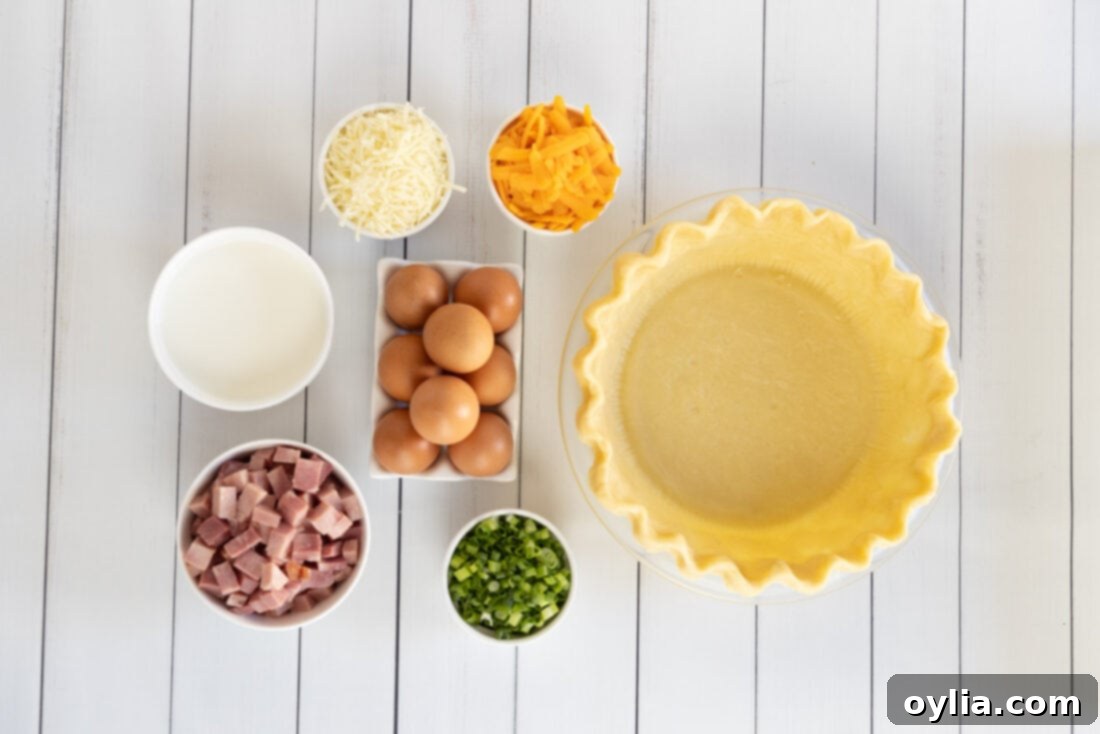Savory Egg Tart 4 Ingredients laid out for Ham and Cheese Quiche