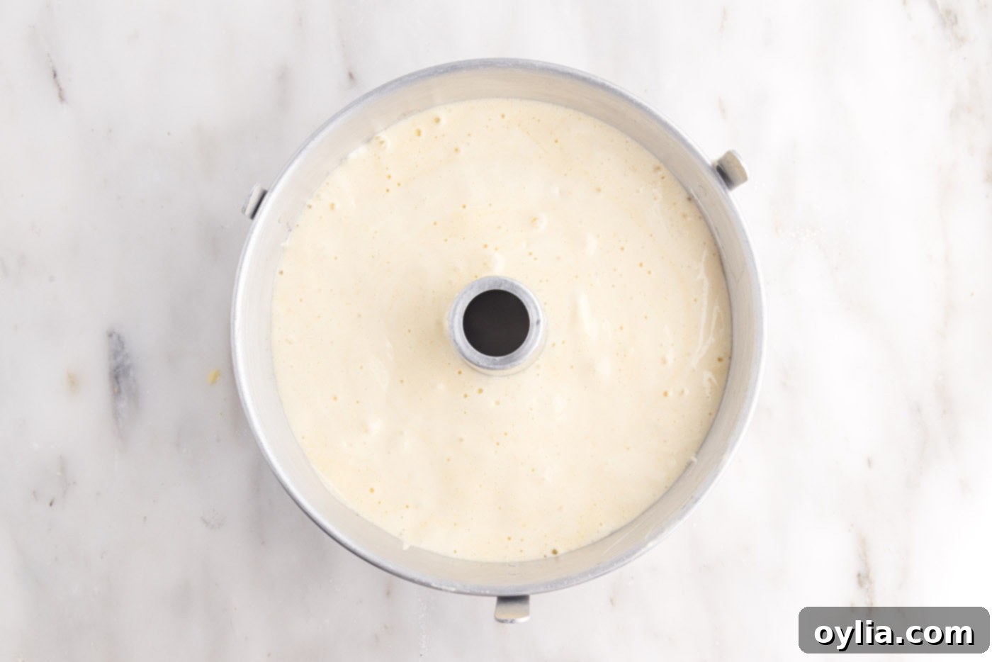 Smooth chiffon cake batter poured into an ungreased tube pan
