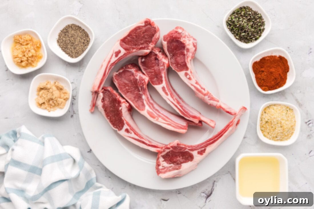 Ingredients laid out for Baked Lamb Chops, including fresh rosemary and various spices