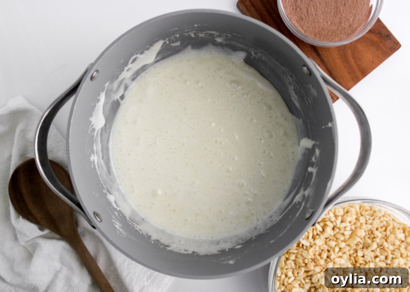 melted marshmallows and butter mixture in a pan
