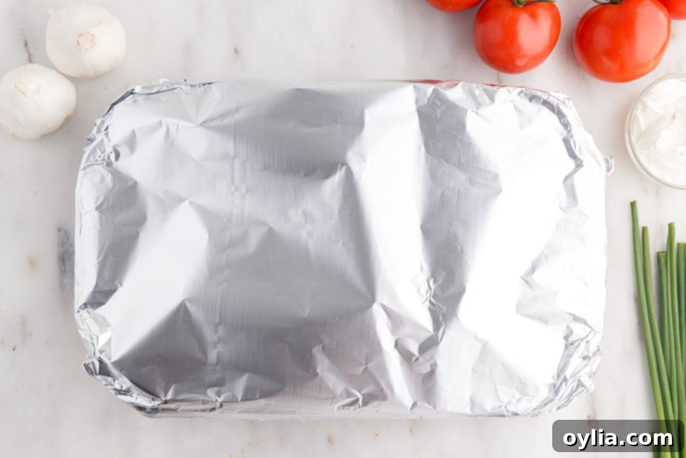 aluminum foil over mexican lasagna