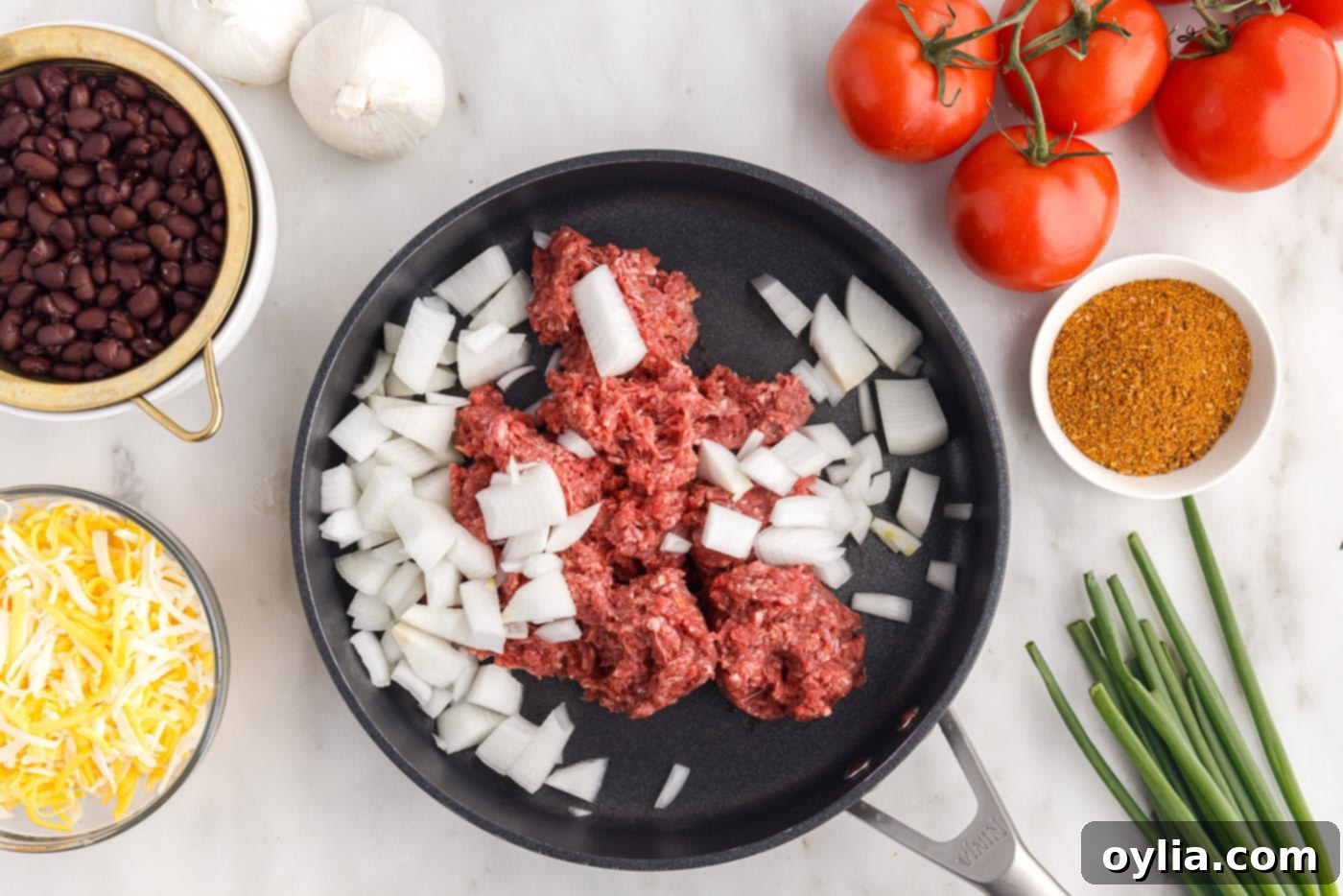 ground beef and onion in a skillet