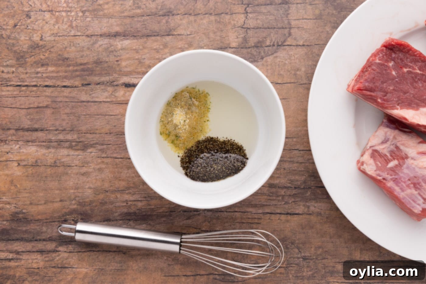 olive oil, salt, and pepper in a bowl