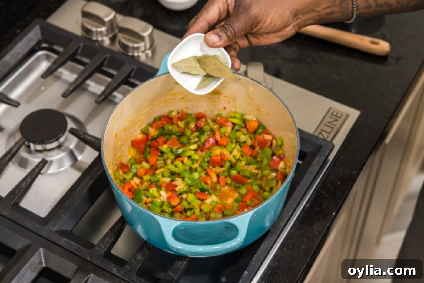 bay leaves over dutch oven with vegetables