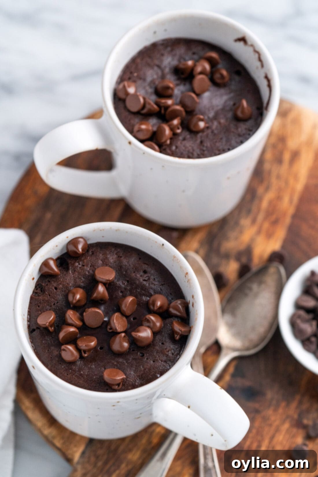 Cozy Mug Brownie 3 Two servings of Brownie in a Mug on a wooden platter