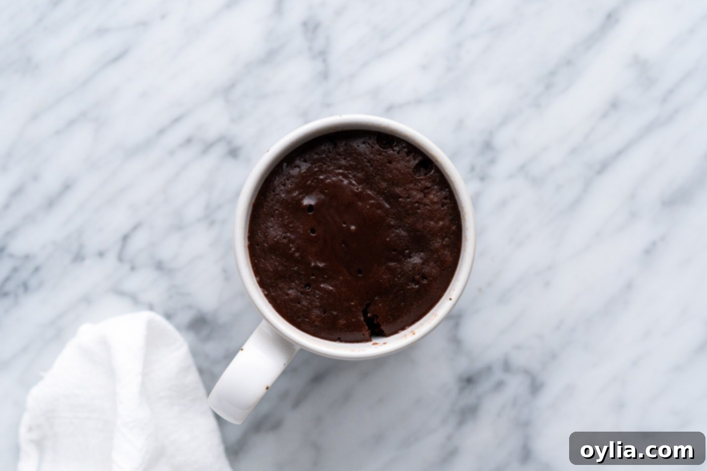 cooked brownie in a coffee cup