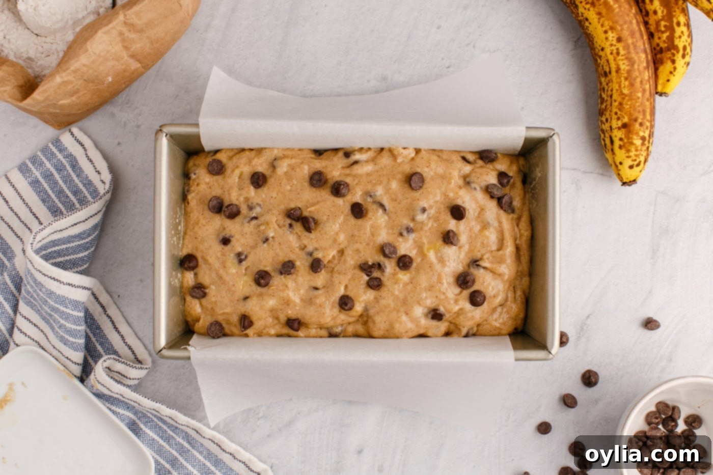chocolate chip banana bread batter in a loaf pan