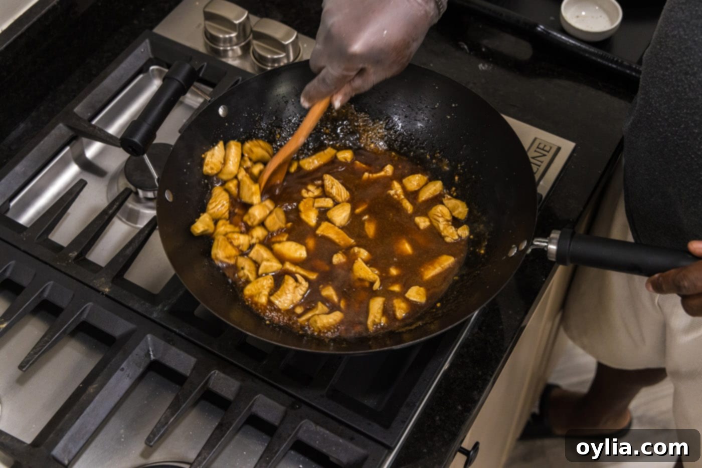 skillet cooked teriyaki chicken simmering in thick sauce