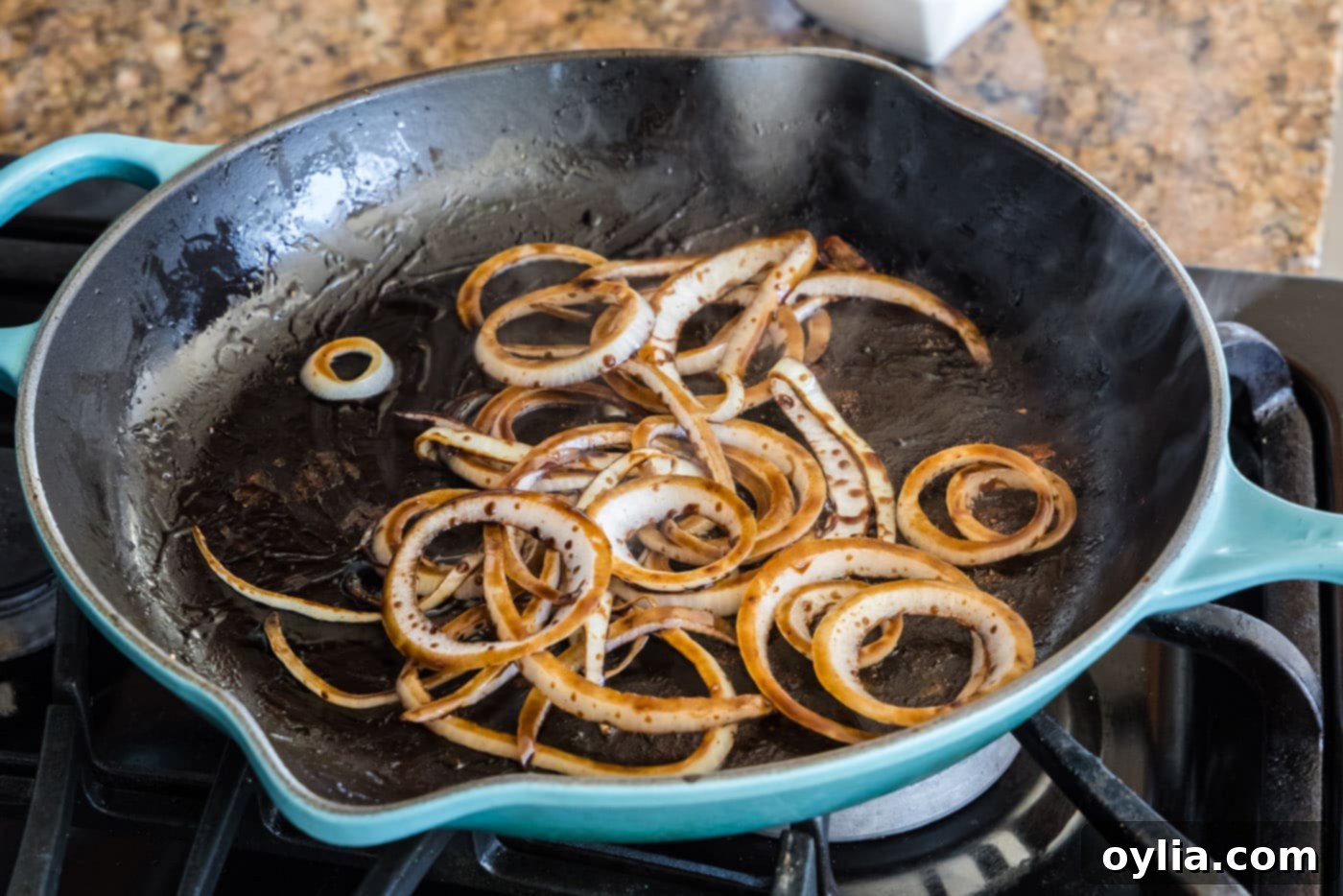 balsamic glazed onions in a skillet, softened and sticky