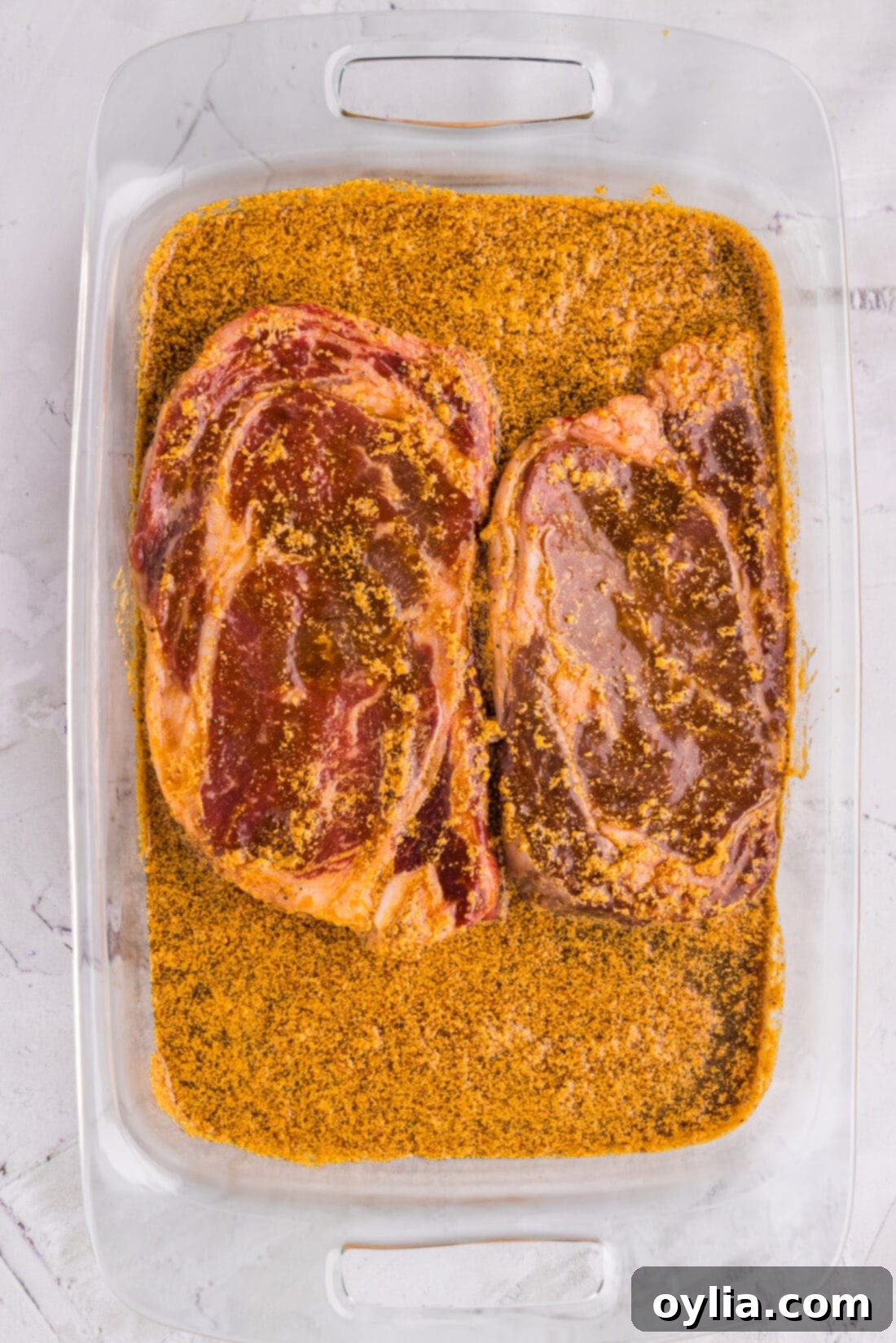 Ribeye Steak Marinade in a glass dish, ready for marinating