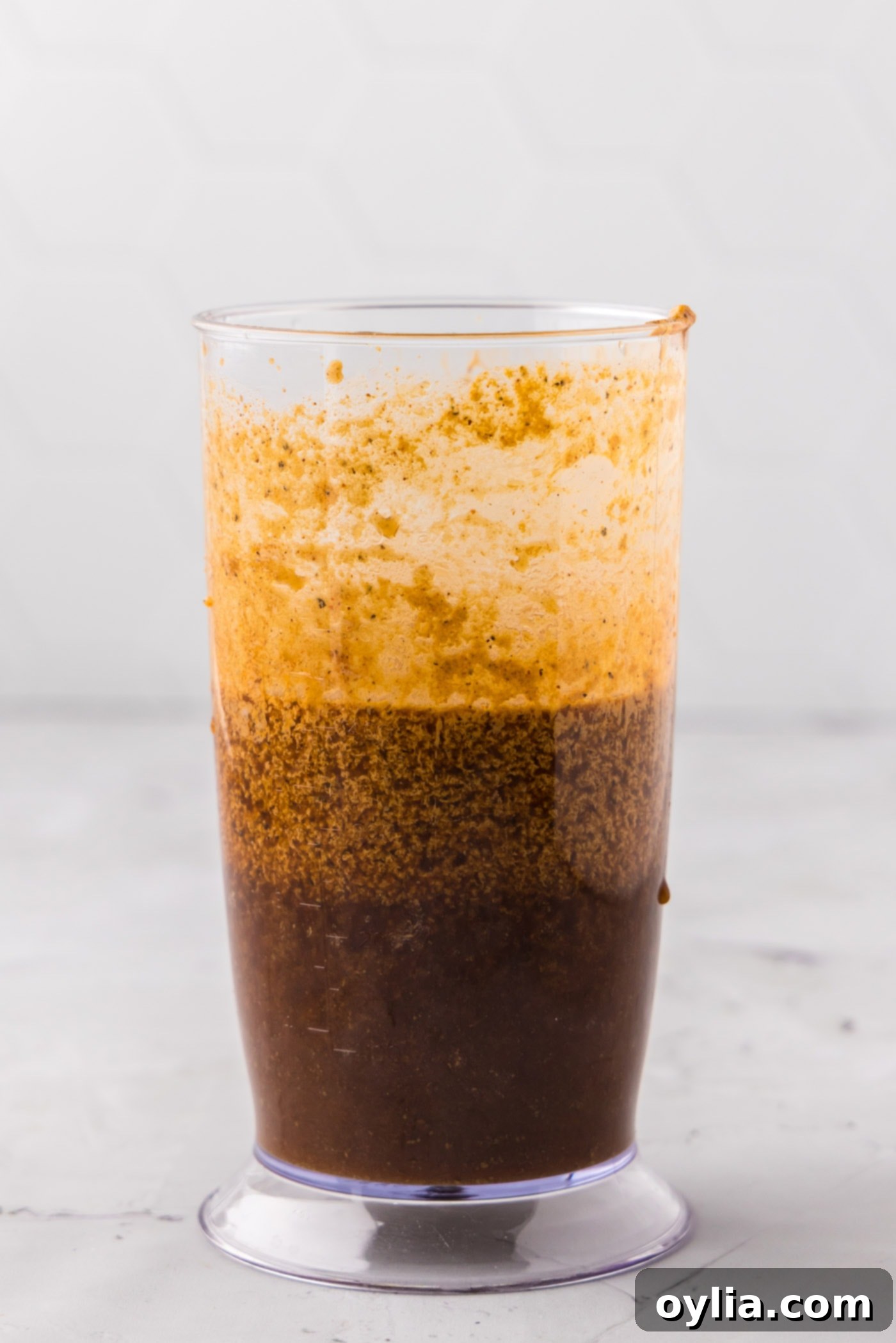 blended steak marinade in a glass container, smooth and ready