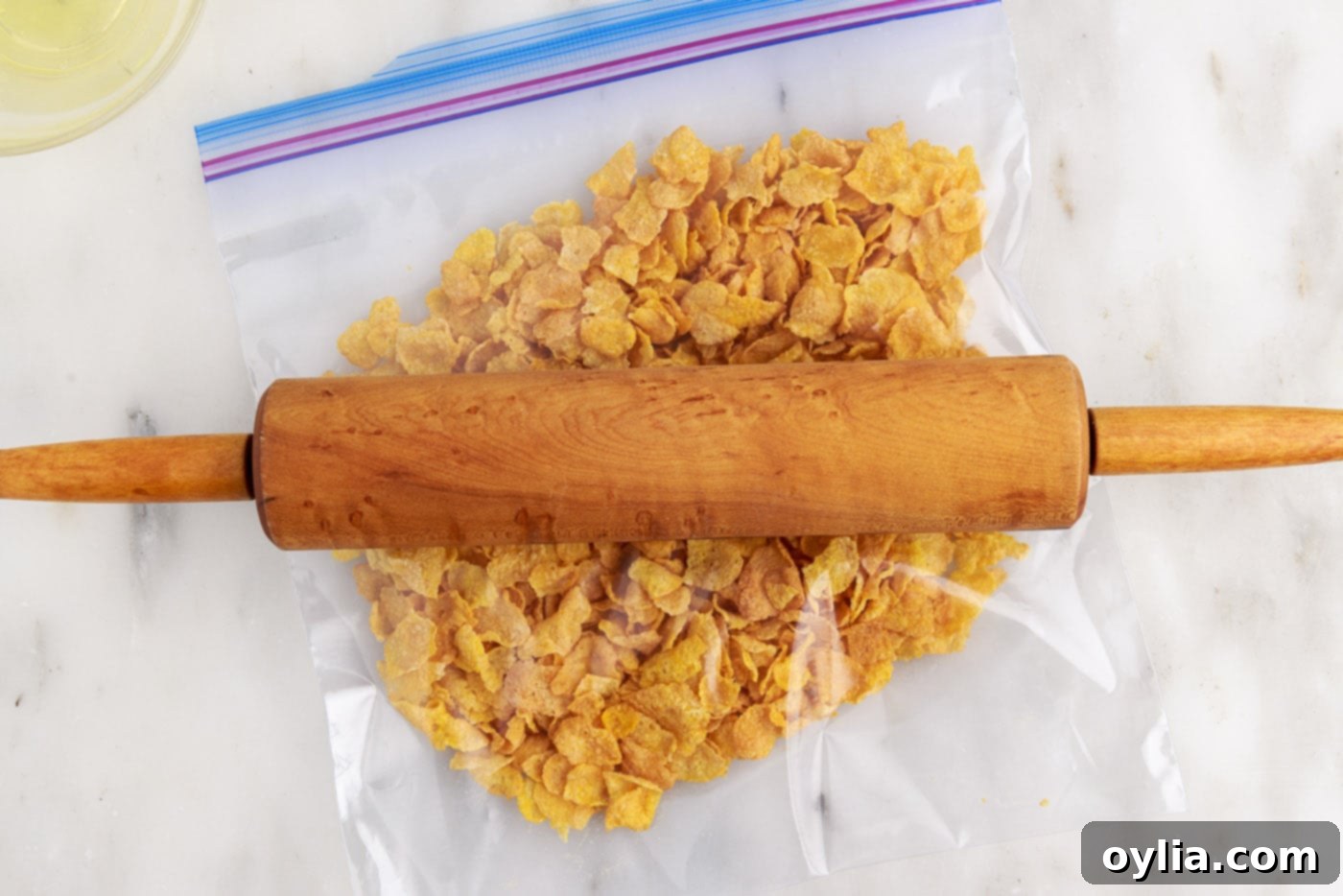 rolling pin crushing cornflakes