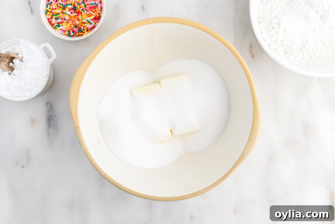 butter and sugar in a mixing bowl