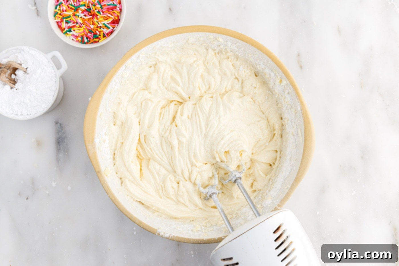 beating cake batter with a hand mixer