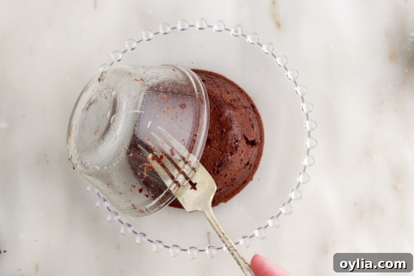 Molten Chocolate Delight 17 turning lava cakes out of ramekin onto a dessert plate