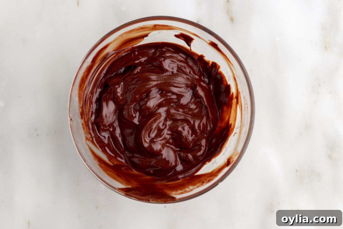 Molten Chocolate Delight 6 melted butter and chocolate mixed smoothly in a bowl