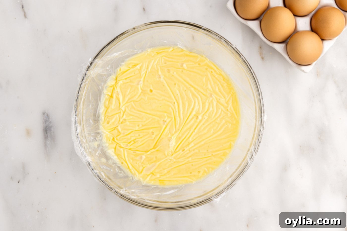 pineapple curd covered in a bowl