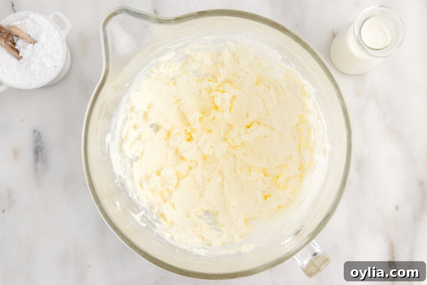 mixed cream cheese and butter in a bowl