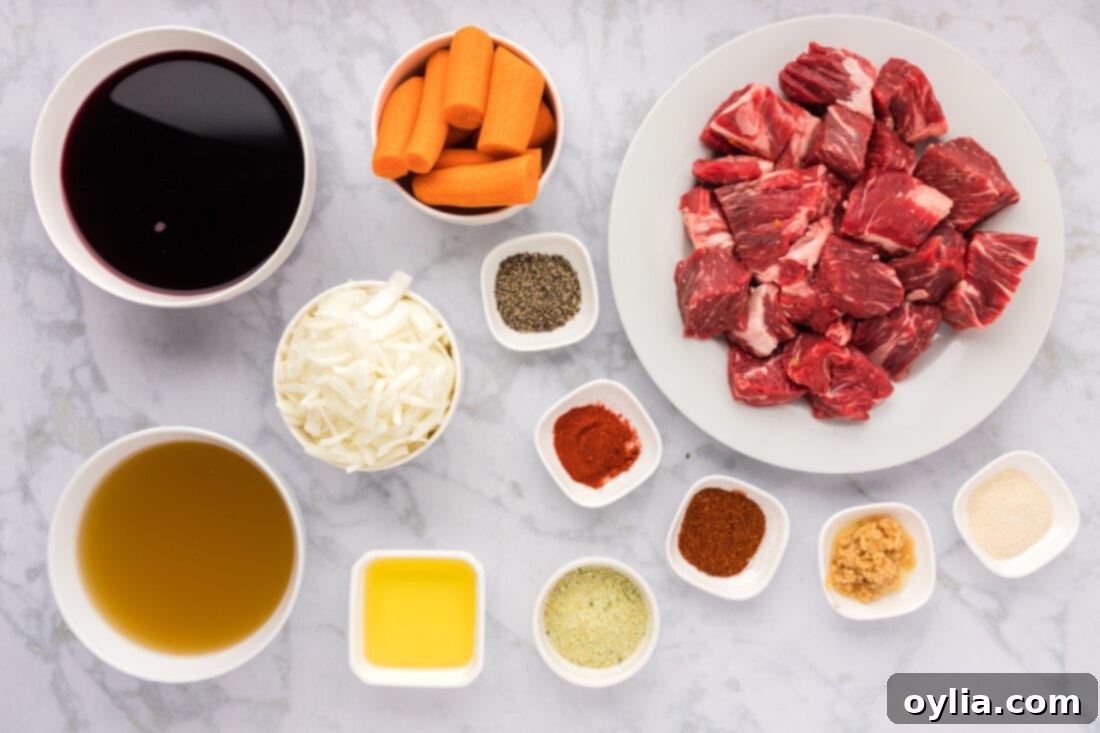 Tender Slow-Cooked Beef 4 Ingredients for Braised Beef, including chuck roast, carrots, onions, garlic, and spices.