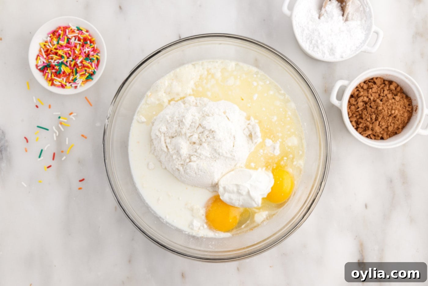 cake mix donut ingredients in a large mixing bowl