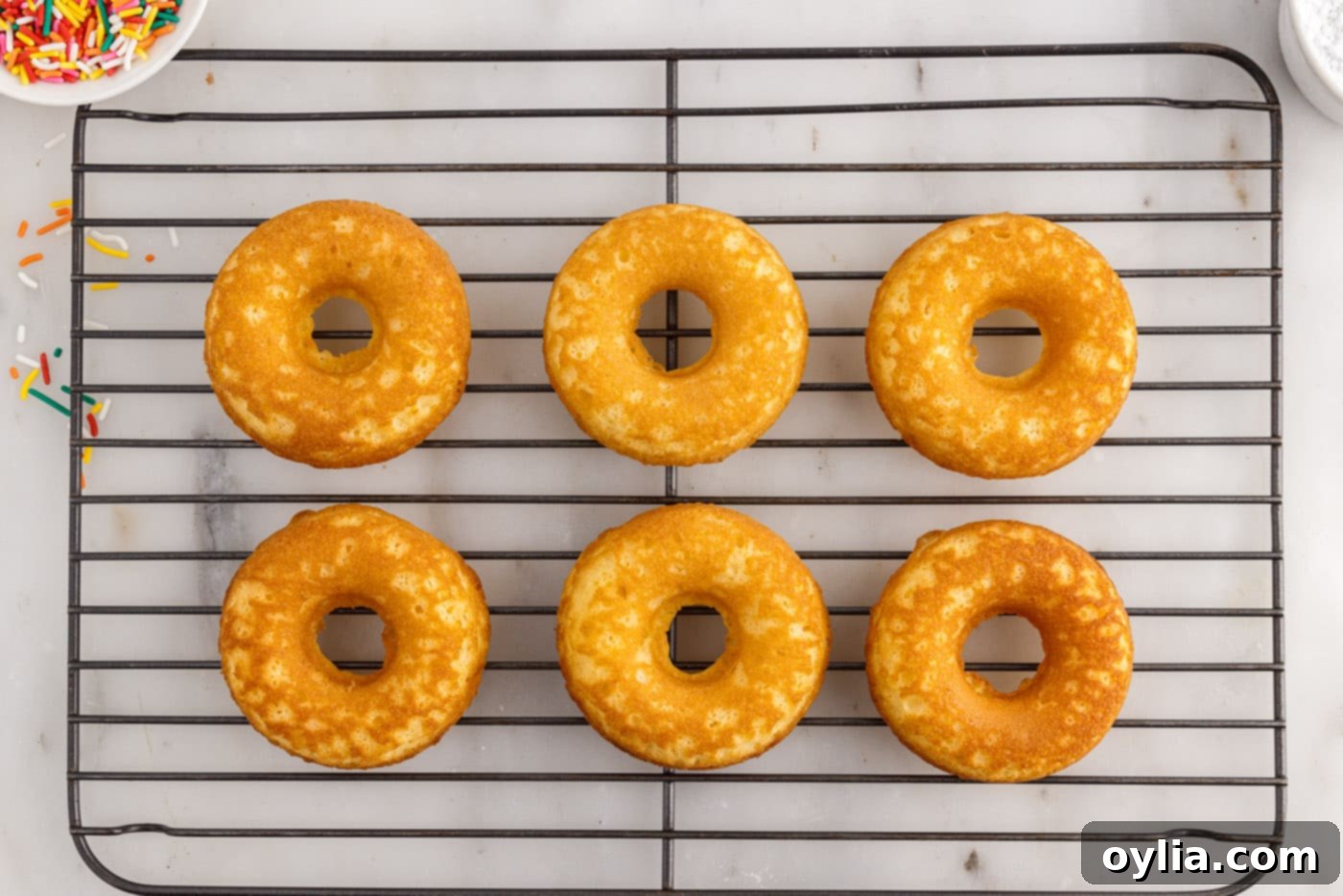 donuts cooling on a wire rack