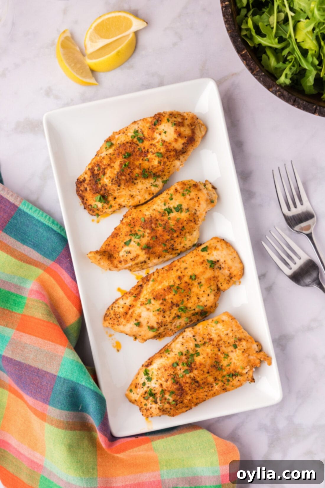 Blackened Chicken on a white serving platter