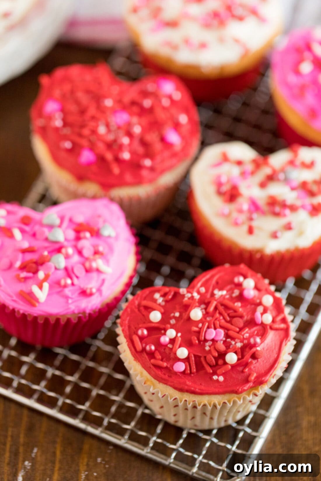 Heart shaped cupcakes on a cooling rack