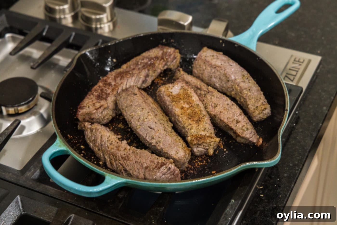 Close-up of seared beef short ribs, showing the beautiful brown crust after browning on all sides.