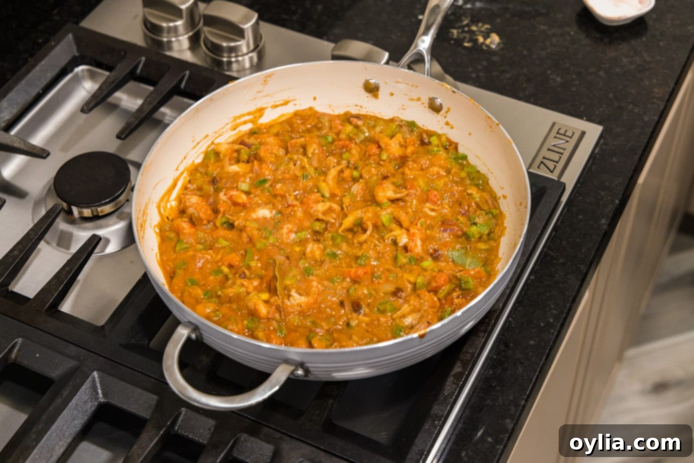 skillet of perfectly simmered crawfish etouffee, ready to serve