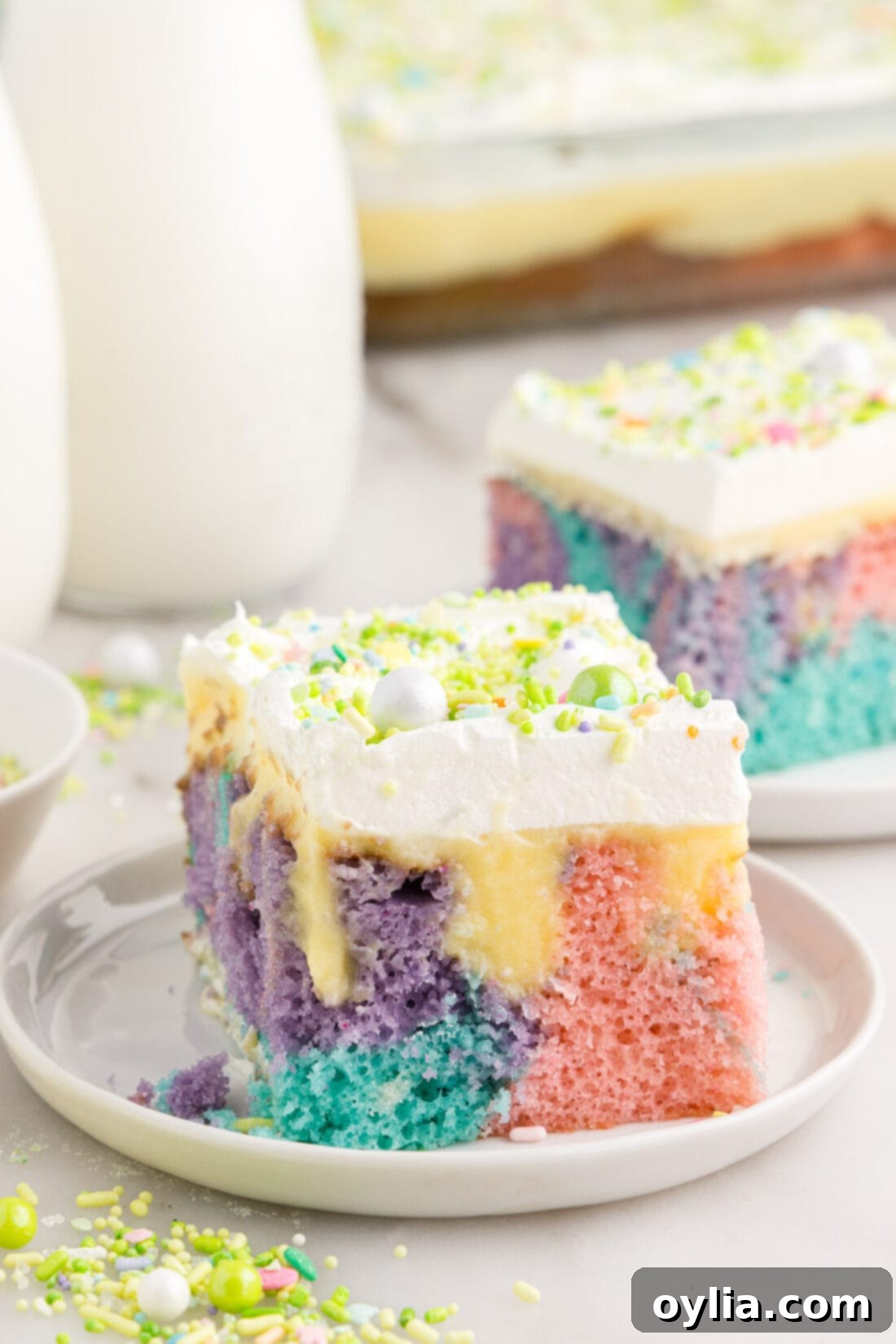 Slice of Easter Poke Cake on a plate