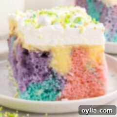 Close up photo of a piece of Easter Poke Cake
