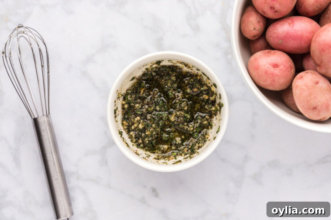 olive oil mixed with seasonings in a bowl